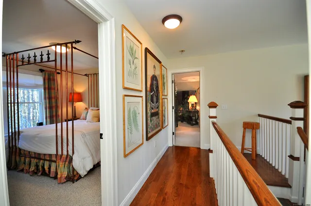 a view of a hallway with a livingroom