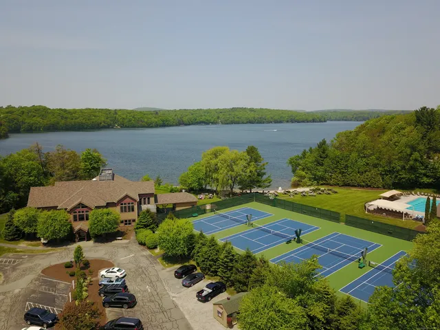 an aerial view of a house with garden space and outdoor space