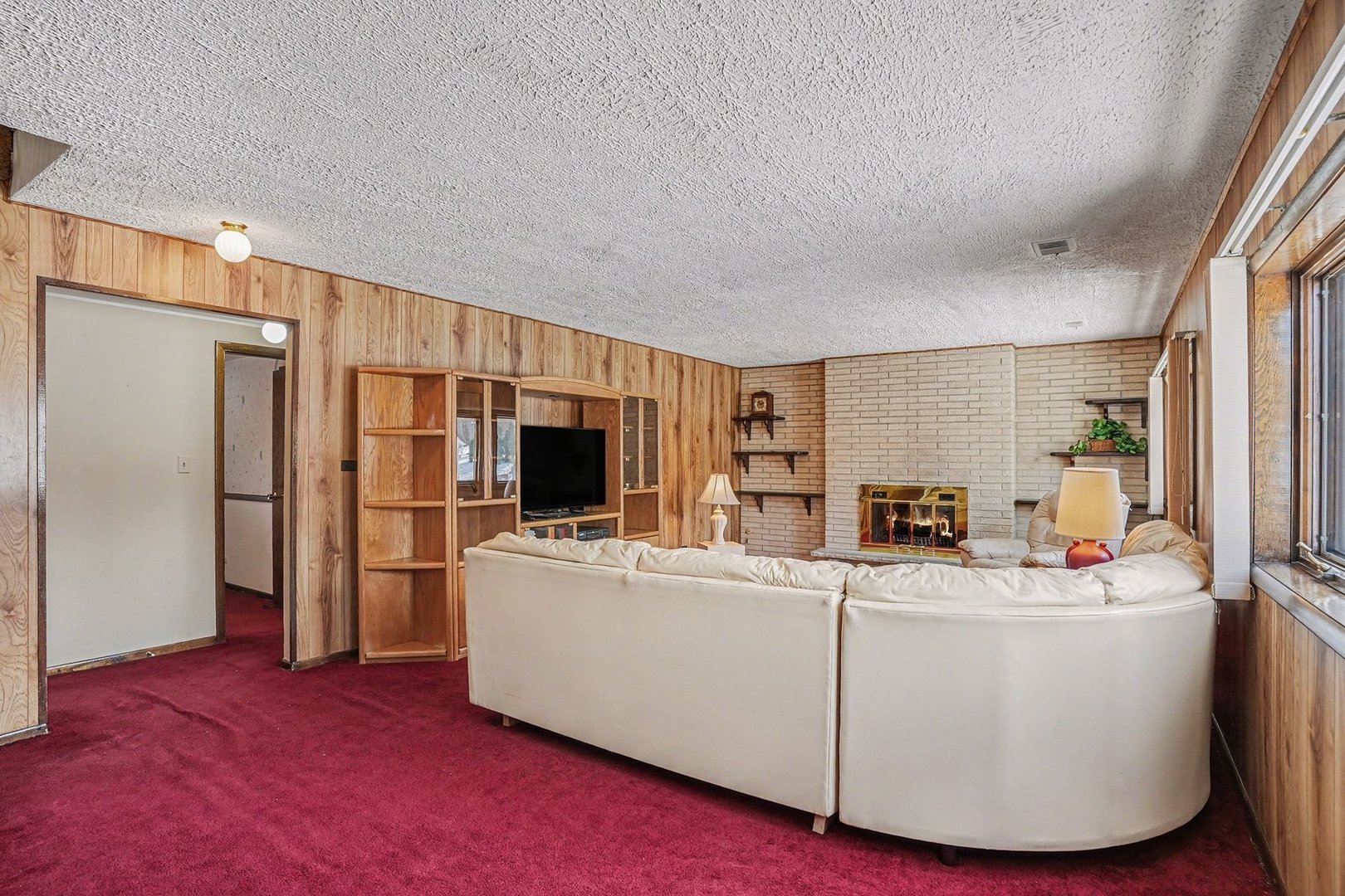 14550 Raneys Lane Orland Park, IL 60462 - Photo 13 of 27 a living room with furniture and a flat screen tv