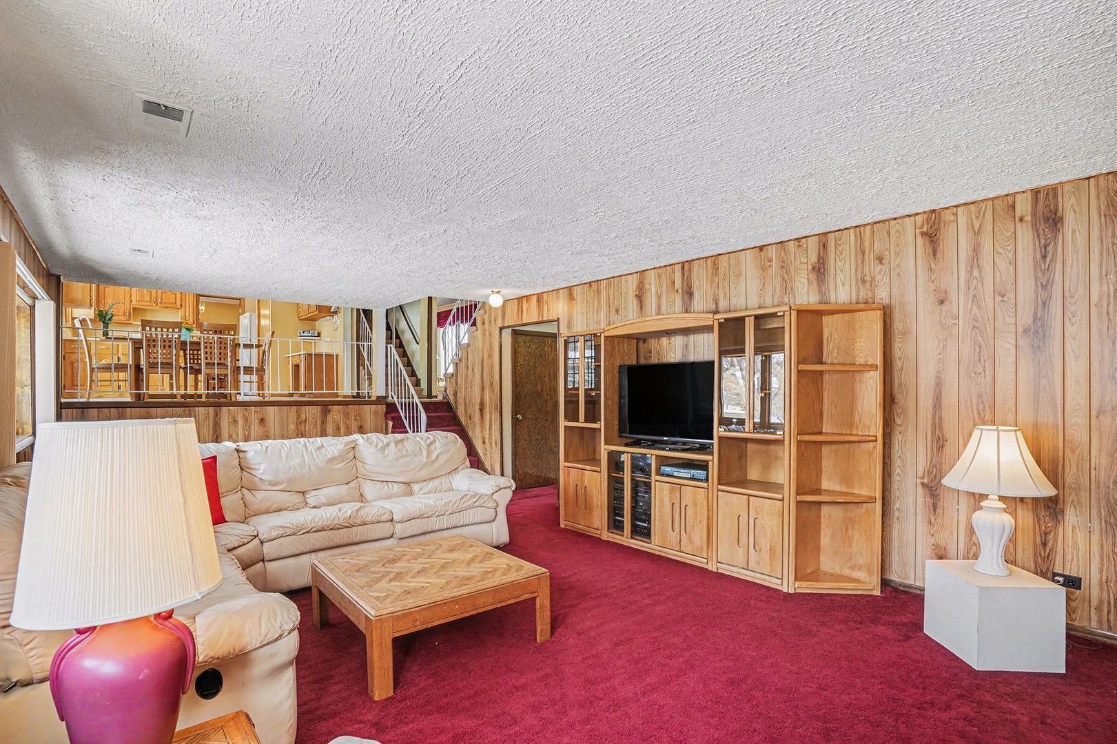 14550 Raneys Lane Orland Park, IL 60462 - Photo 14 of 27 a living room with furniture and a flat screen tv