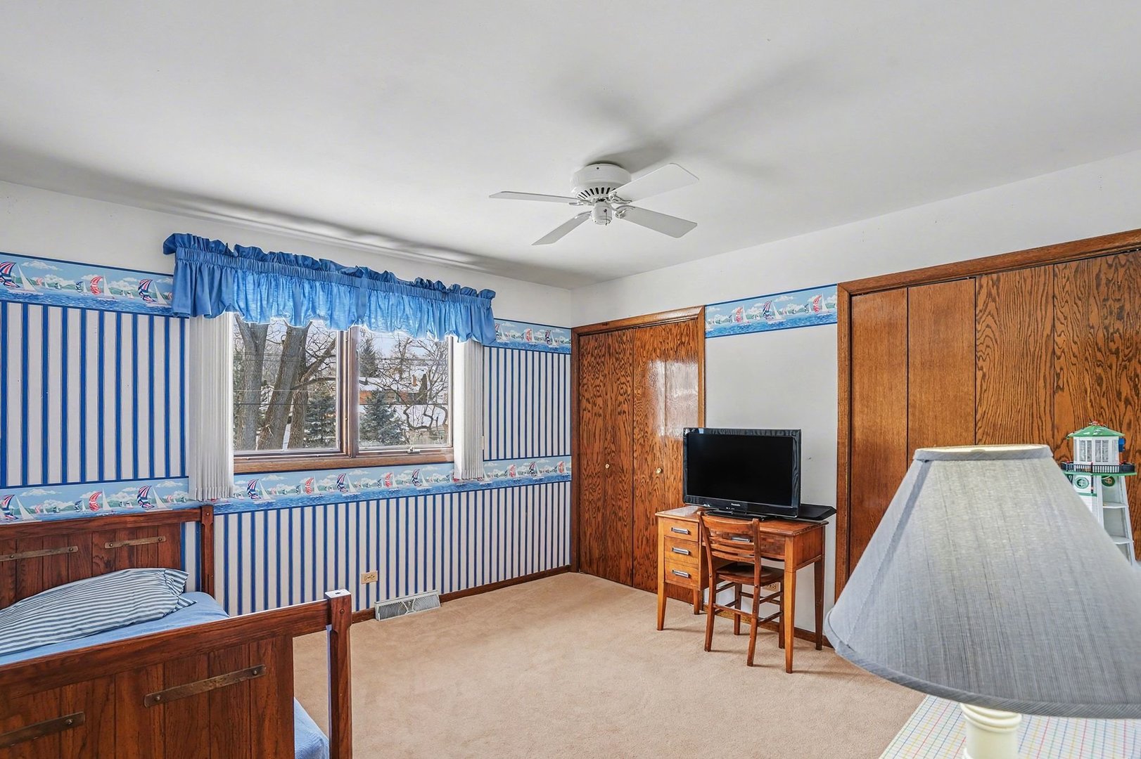 14550 Raneys Lane Orland Park, IL 60462 - Photo 19 of 27 a bedroom with furniture and a window