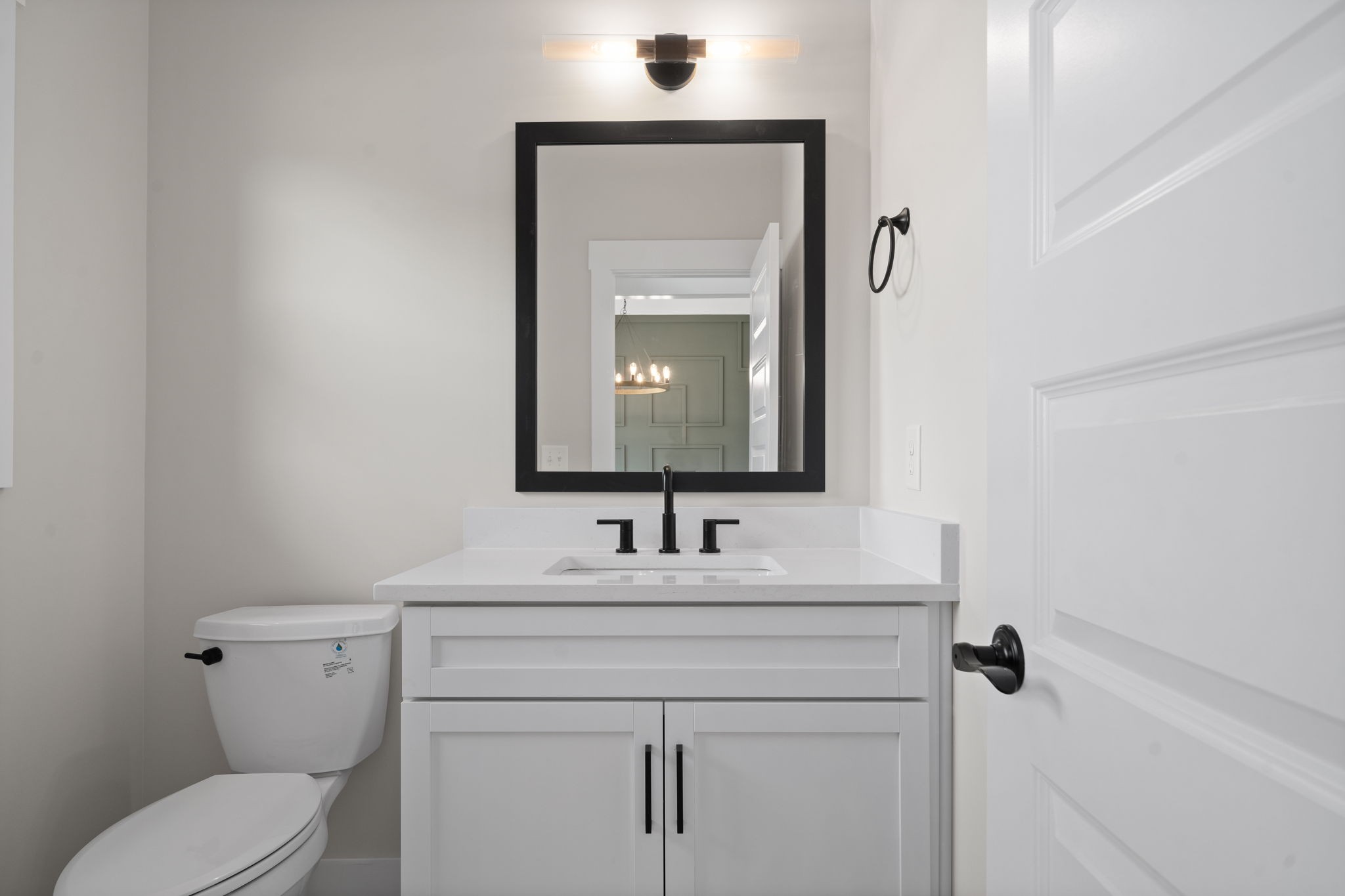 1045 Gratton Road Clarksville, TN 37043 - Photo 16 of 38 a bathroom with a toilet sink and mirror