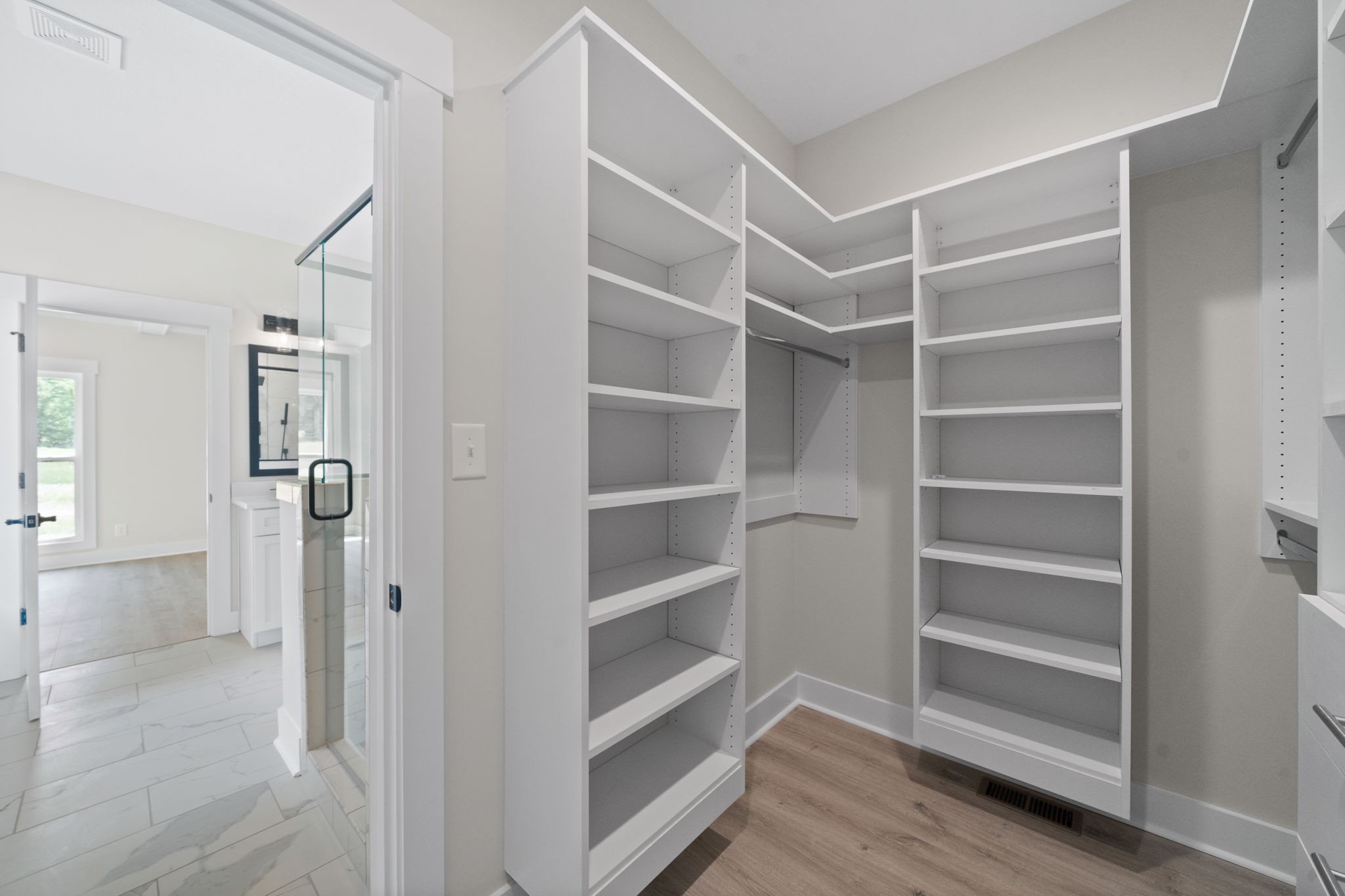 1045 Gratton Road Clarksville, TN 37043 - Photo 23 of 38 a view of walk in closet with empty racks