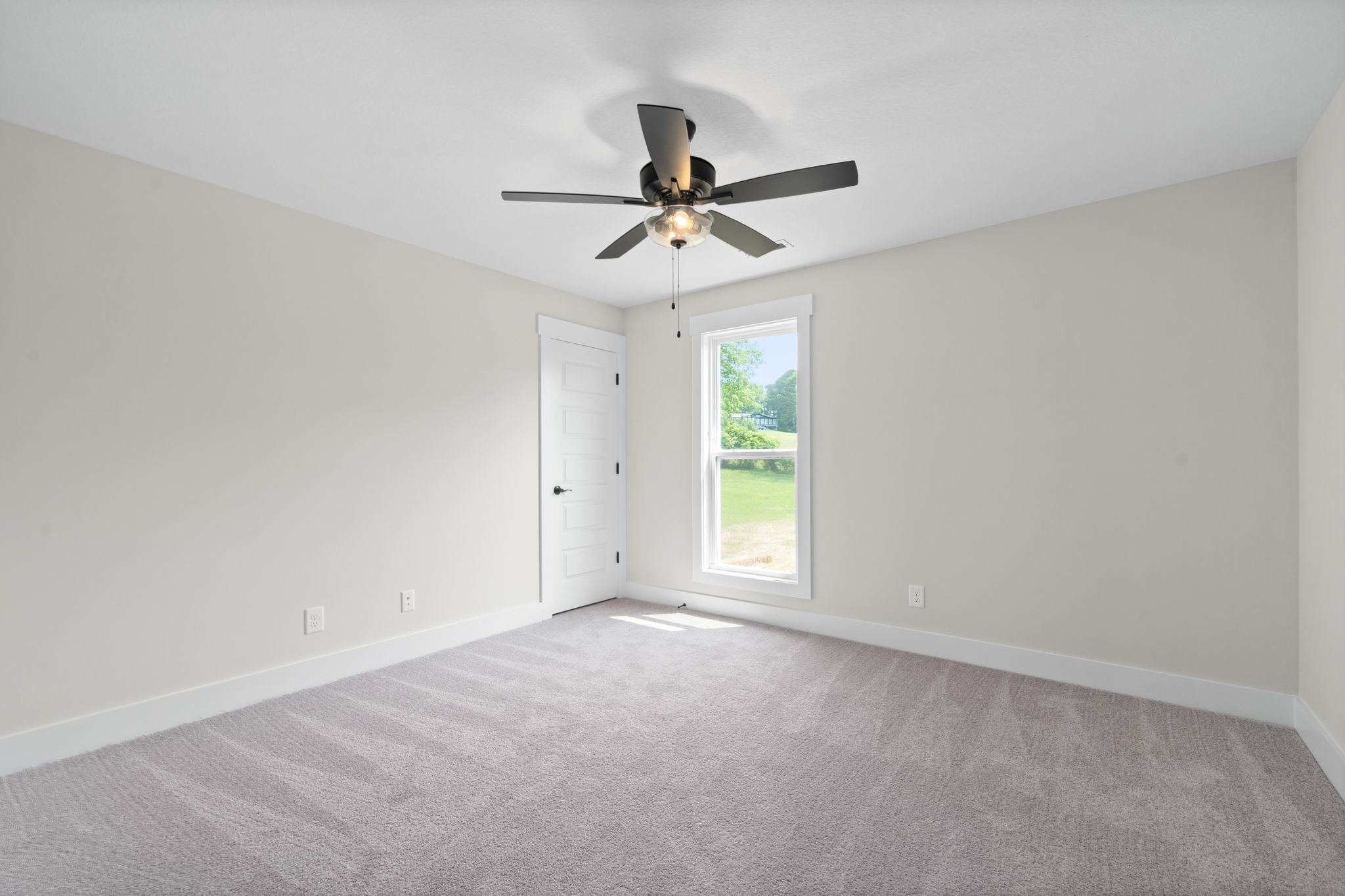 1045 Gratton Road Clarksville, TN 37043 - Photo 25 of 38 an empty room with windows and fan