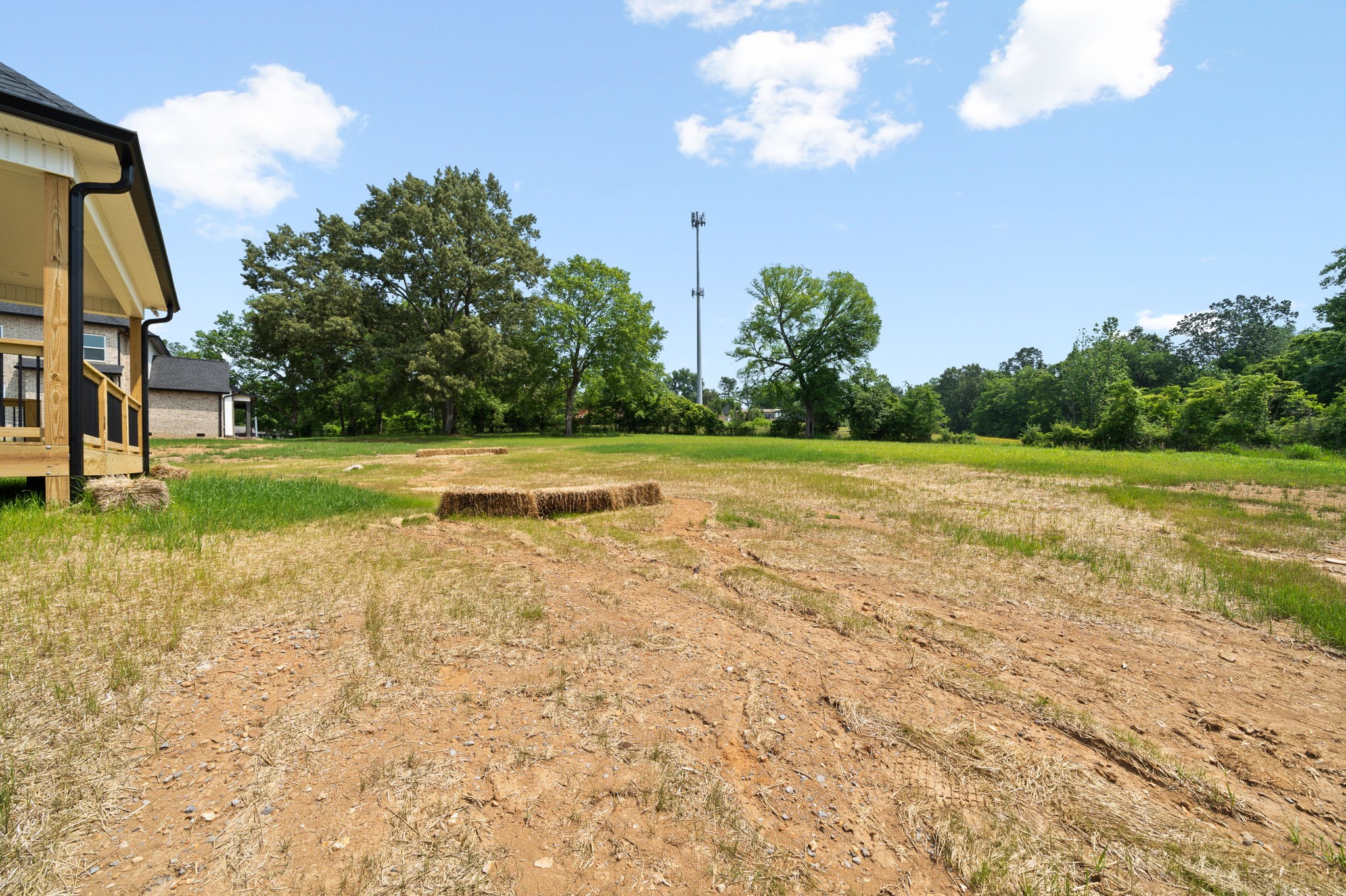 1045 Gratton Road Clarksville, TN 37043 - Photo 38 of 38 a view of a big yard with swimming pool and wooden fence