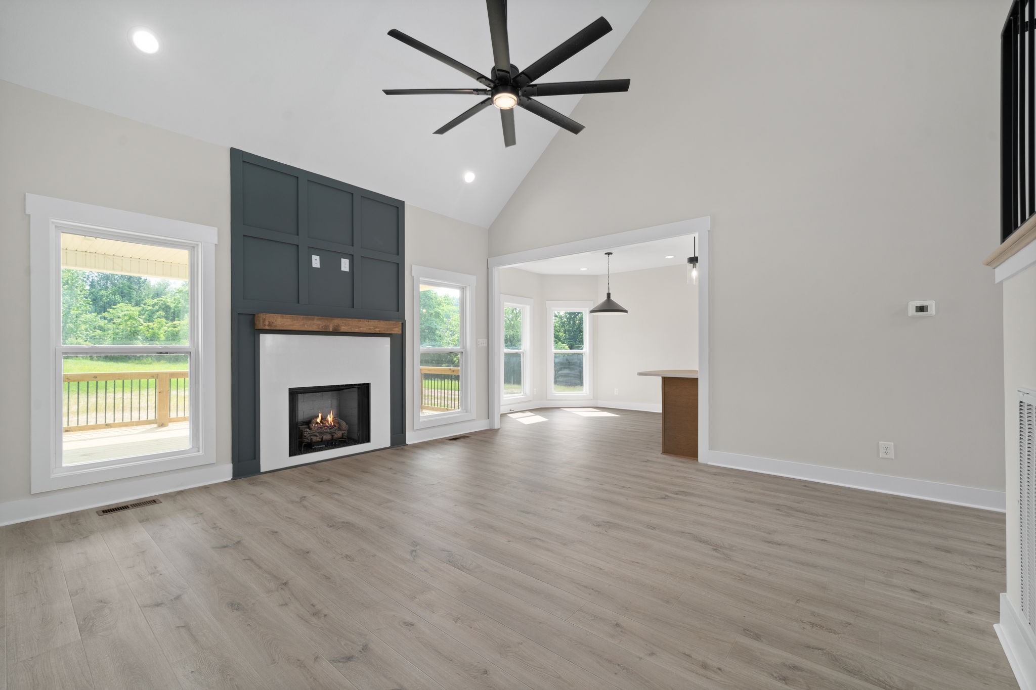 1045 Gratton Road Clarksville, TN 37043 - Photo 6 of 38 a view of empty room with fireplace and wooden floor