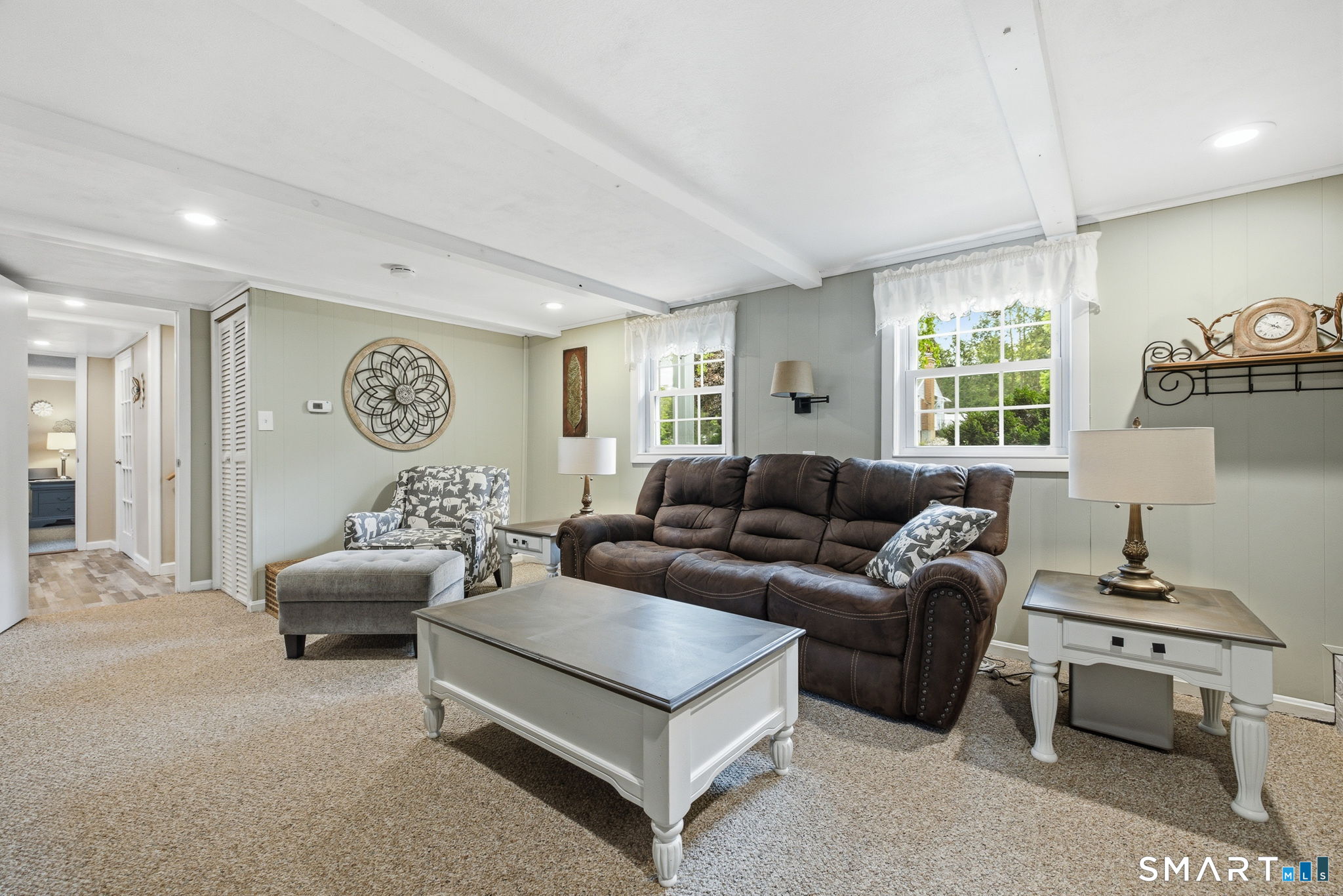 7 Stardust Drive Enfield, CT 06082 - Photo 21 of 38 a living room with furniture and a window