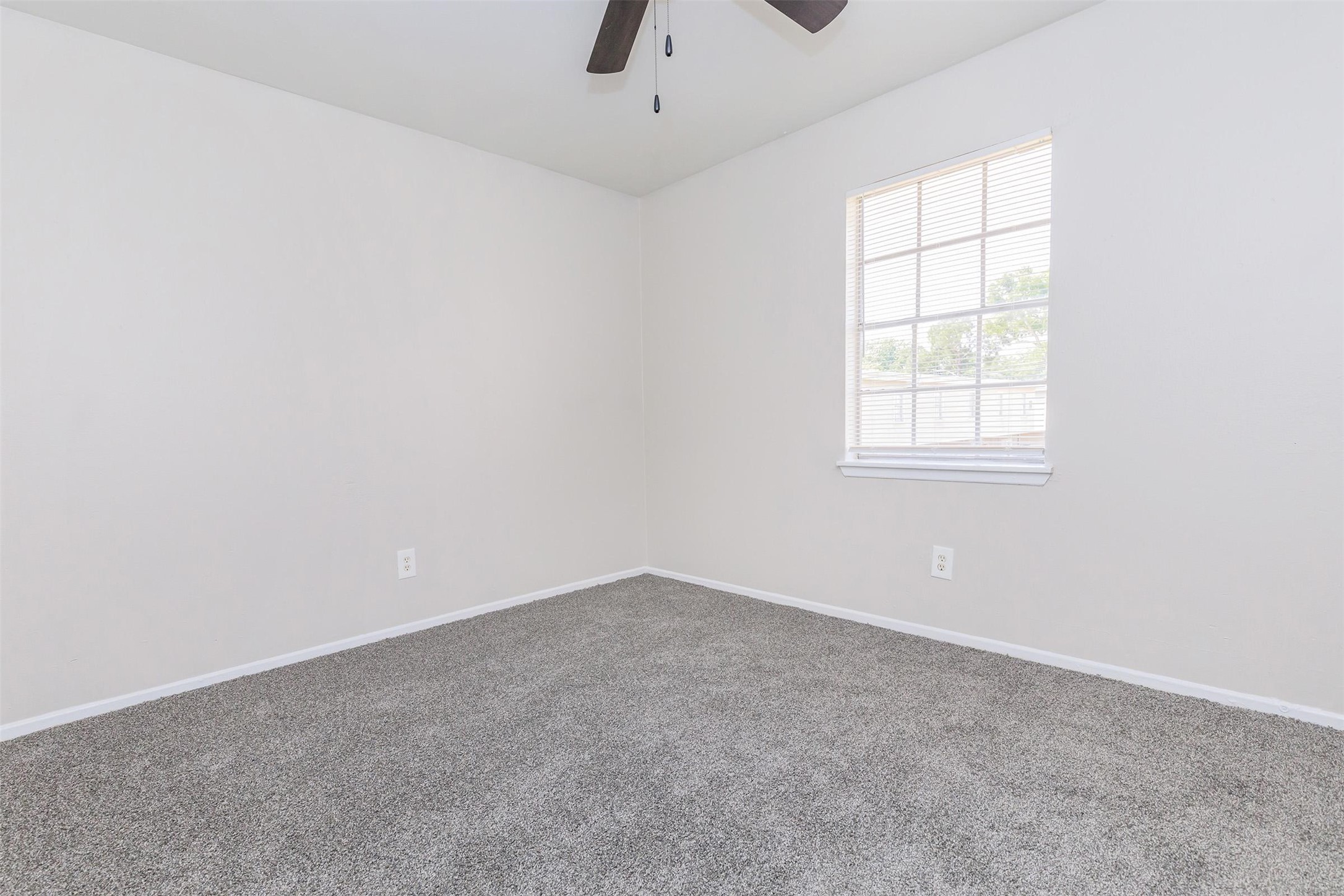 8271 Stone Street, Unit 7137 Houston, TX 77061 - Photo 12 of 28 an empty room with a window