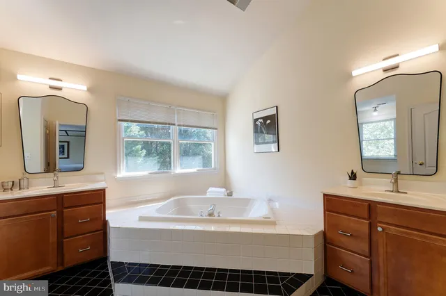 a bedroom with bed and a couch