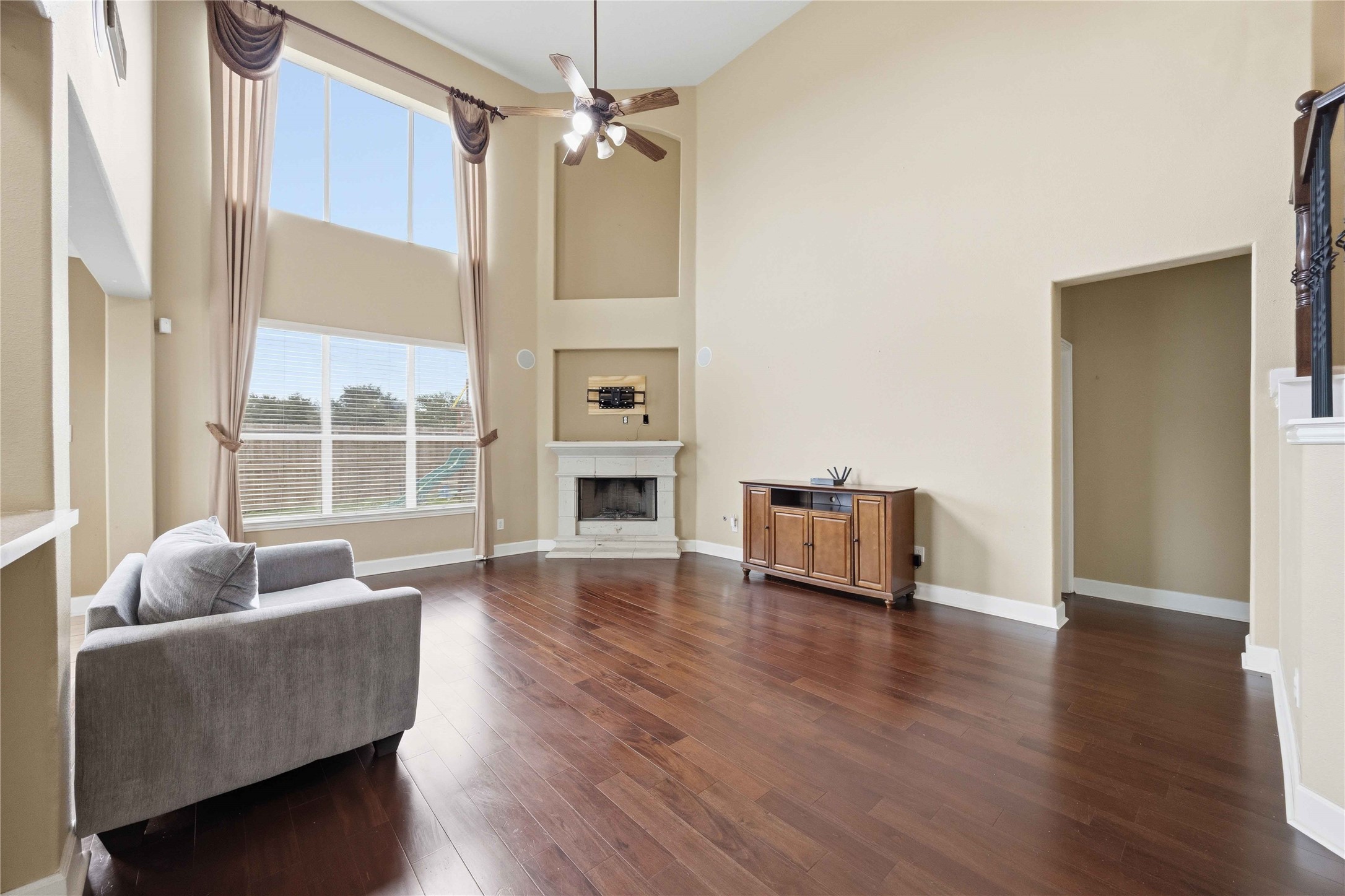 803 Northridge Terrace Lane Spring, TX 77373 - Photo 9 of 42 a living room with furniture wooden floor and a large window
