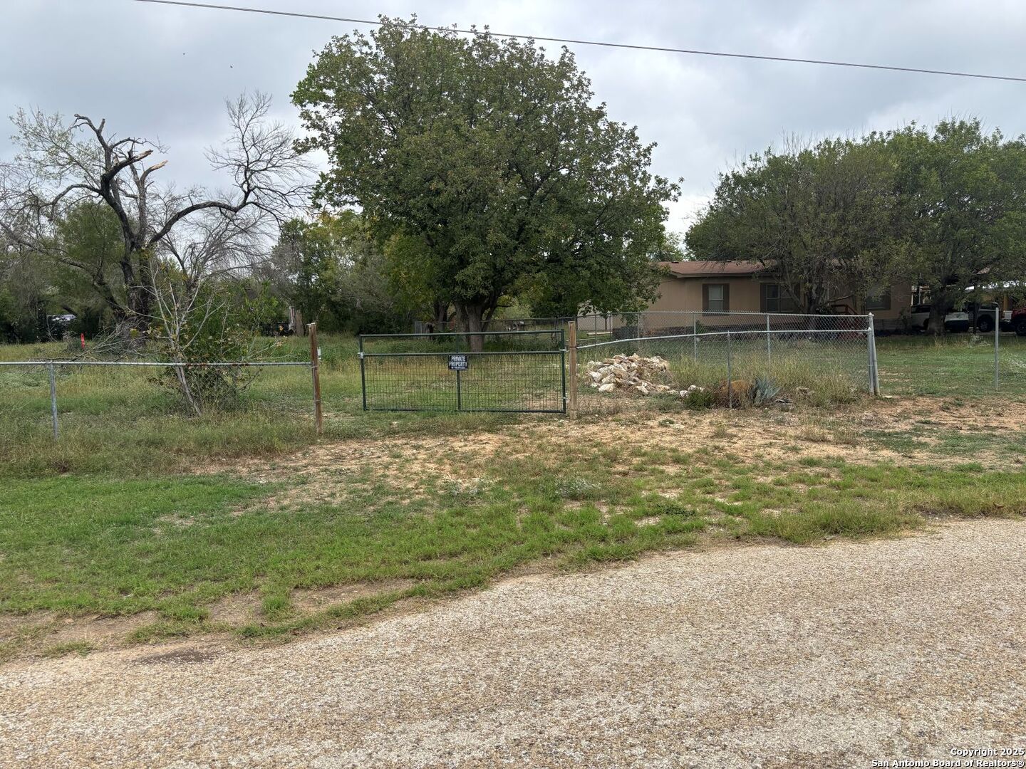 7827 Von Ormy Road Von Ormy, TX 78073 - Photo 5 of 8 a view of a small yard
