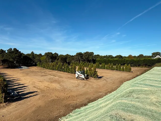 a view of a lake with houses in the background