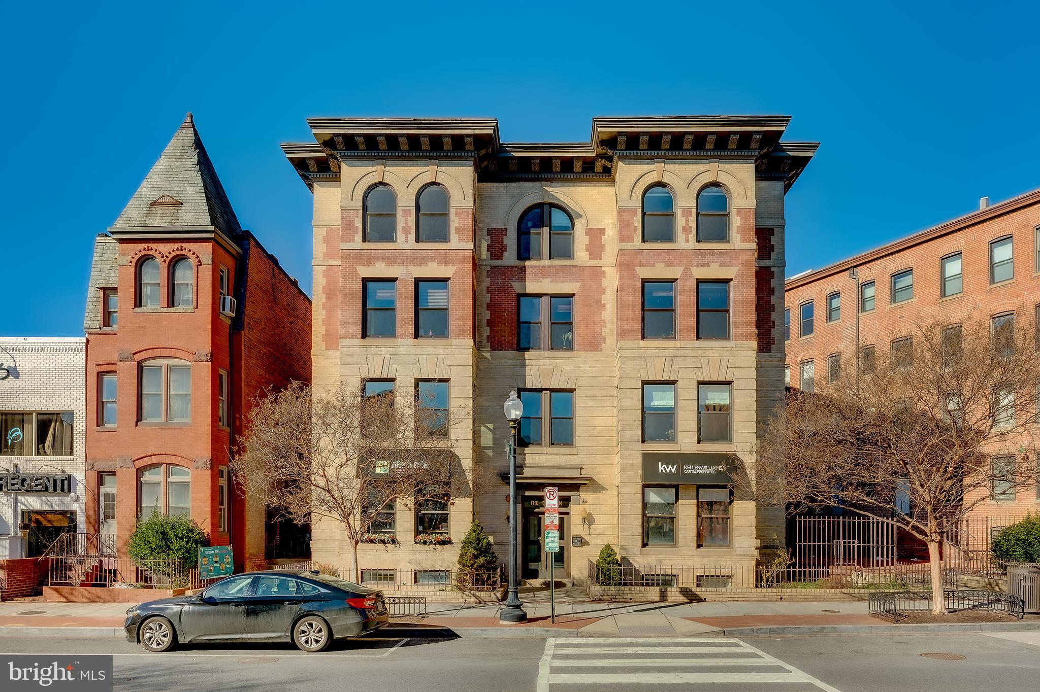 1918 18th Street Northwest, Unit 42 Washington, DC 20009 - Photo 2 of 22 a car parked in front of a building
