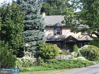 57 Ebelhare Road Pottstown, PA 19465 - Photo 1 of 12 an aerial view of a house with a yard and potted plants
