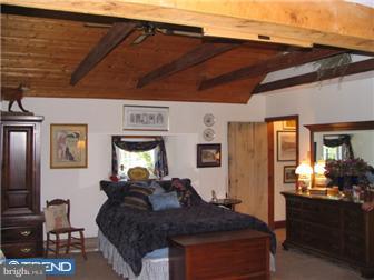 57 Ebelhare Road Pottstown, PA 19465 - Photo 5 of 12 a bed room with a bed and dresser