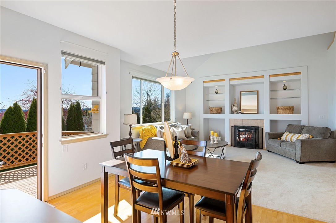 2988 Rickey Road Bremerton, WA 98310 - Photo 12 of 34 a view of a dining room with furniture window and wooden floor