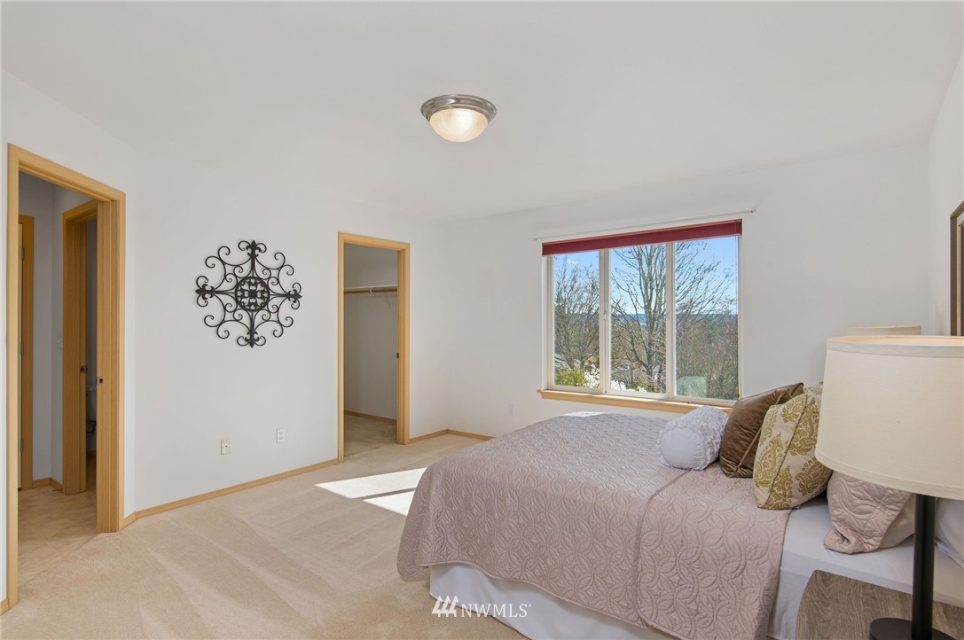 2988 Rickey Road Bremerton, WA 98310 - Photo 18 of 34 a bedroom with a bed and a window