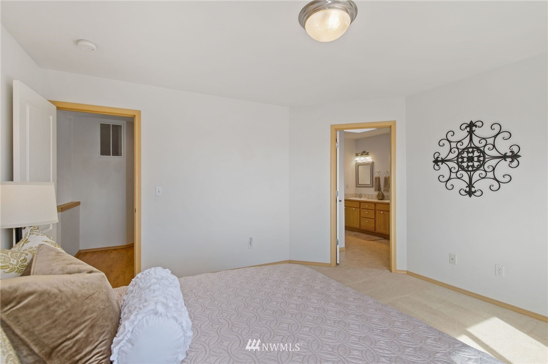 2988 Rickey Road Bremerton, WA 98310 - Photo 24 of 34 a bedroom with a bed and a couch