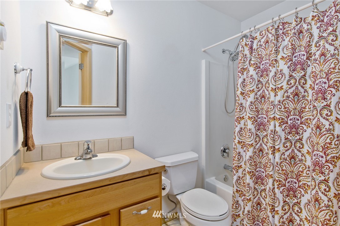 2988 Rickey Road Bremerton, WA 98310 - Photo 26 of 34 a bathroom with a sink and a toilet