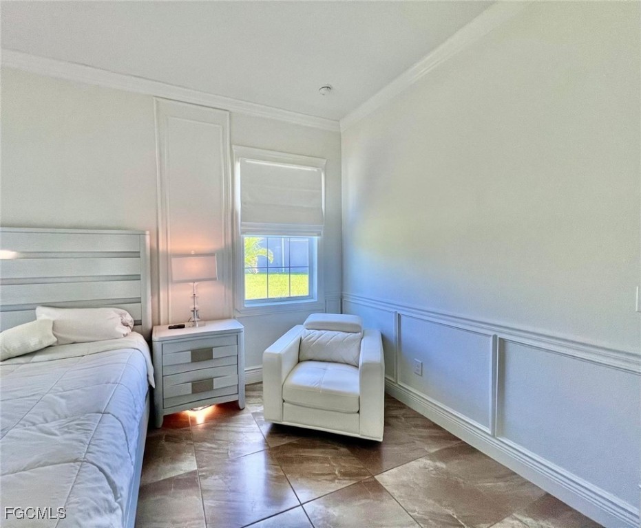 7121 Hatpin Loop Wesley Chapel, FL 33545 - Photo 15 of 24 a bedroom with a bed and a couch