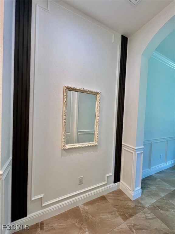 7121 Hatpin Loop Wesley Chapel, FL 33545 - Photo 17 of 24 an empty room with wooden floor and a window