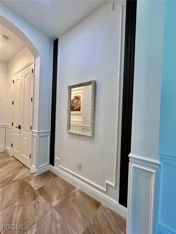 7121 Hatpin Loop Wesley Chapel, FL 33545 - Photo 18 of 24 a view of a livingroom with wooden floor and closet