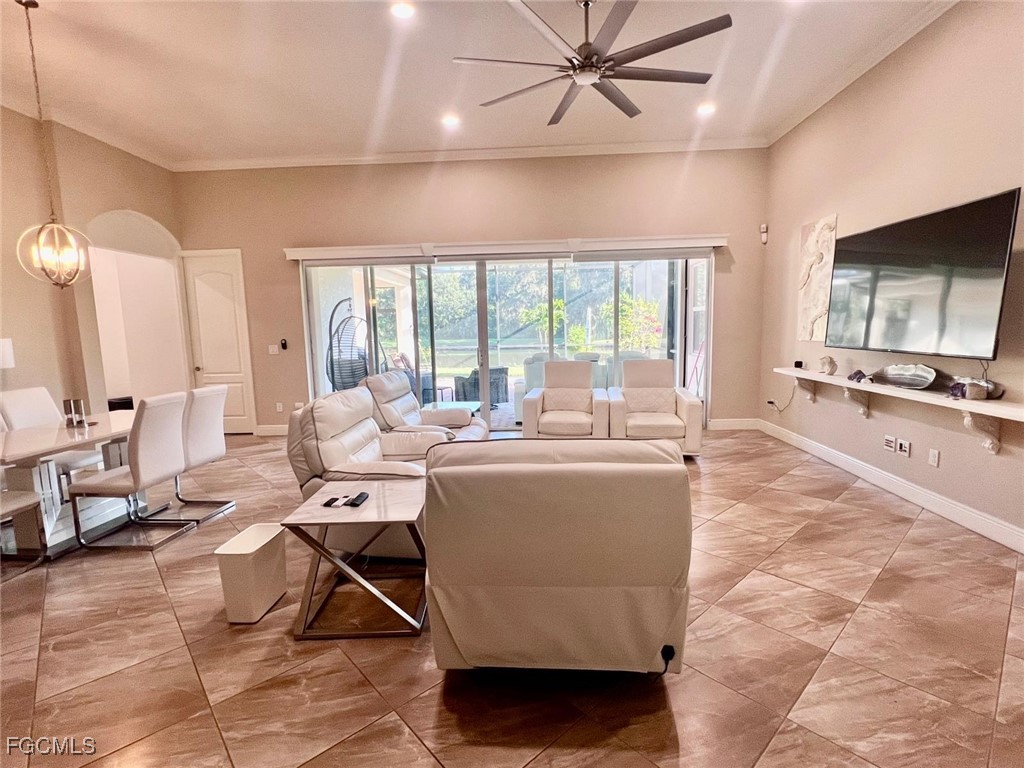 7121 Hatpin Loop Wesley Chapel, FL 33545 - Photo 2 of 24 a living room with a large window and furniture