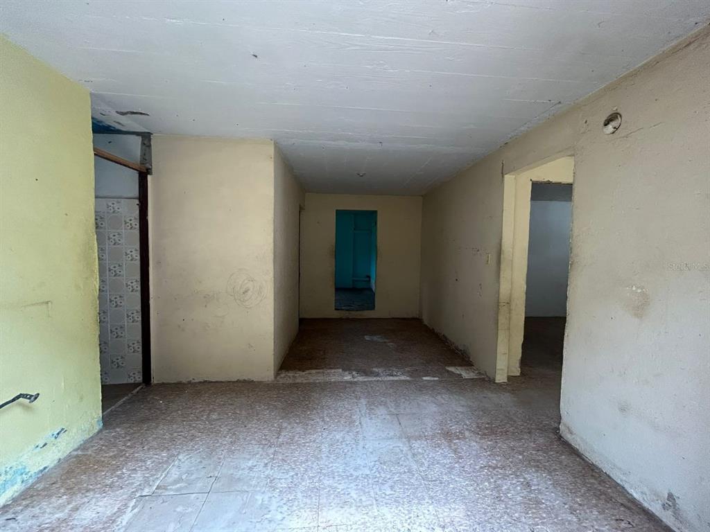 5 Calle Barceloneta, PR 00617 - Photo 11 of 40 a view of room with hallway
