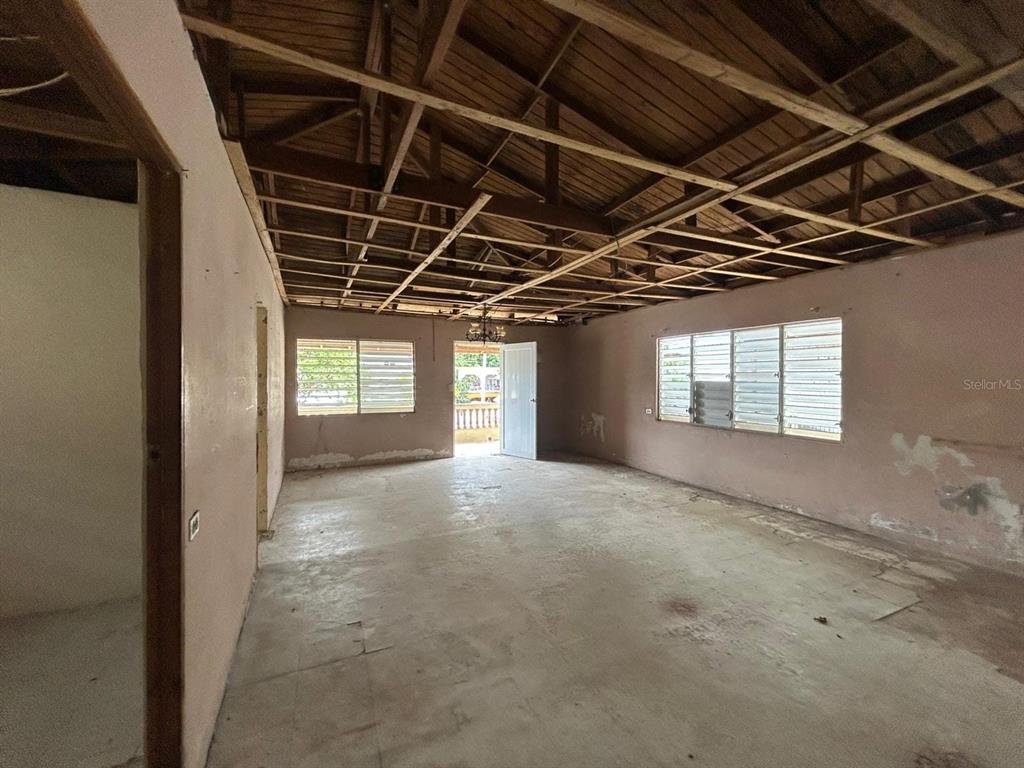 5 Calle Barceloneta, PR 00617 - Photo 19 of 40 a view of large room with wooden walls
