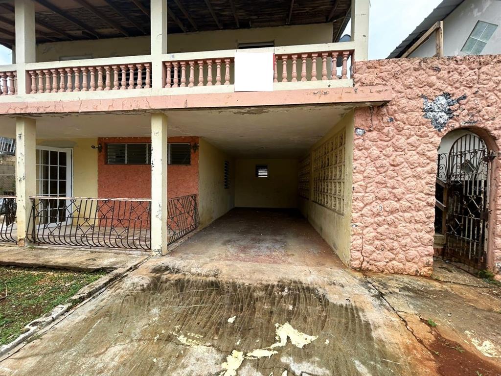 5 Calle Barceloneta, PR 00617 - Photo 2 of 40 front view of a house
