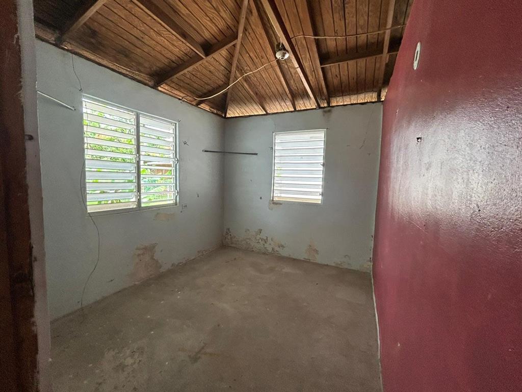 5 Calle Barceloneta, PR 00617 - Photo 24 of 40 an empty room with windows
