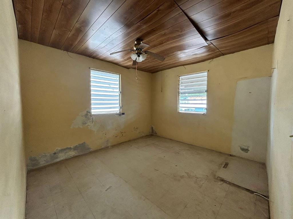 5 Calle Barceloneta, PR 00617 - Photo 25 of 40 an empty room with windows