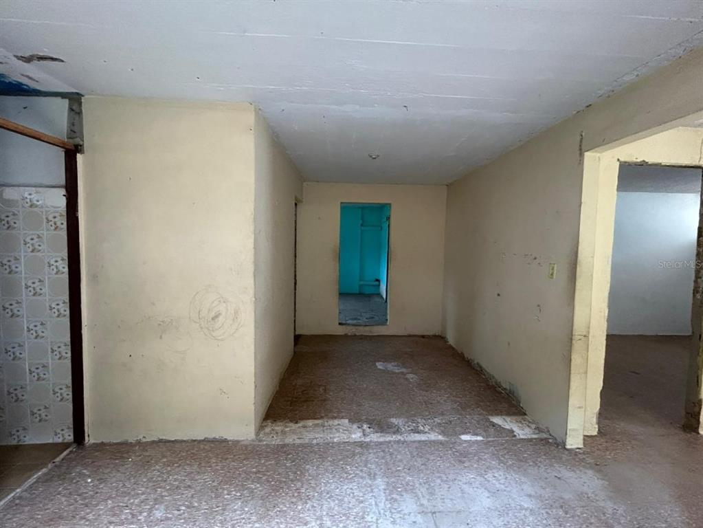 5 Calle Barceloneta, PR 00617 - Photo 33 of 40 an empty room with windows