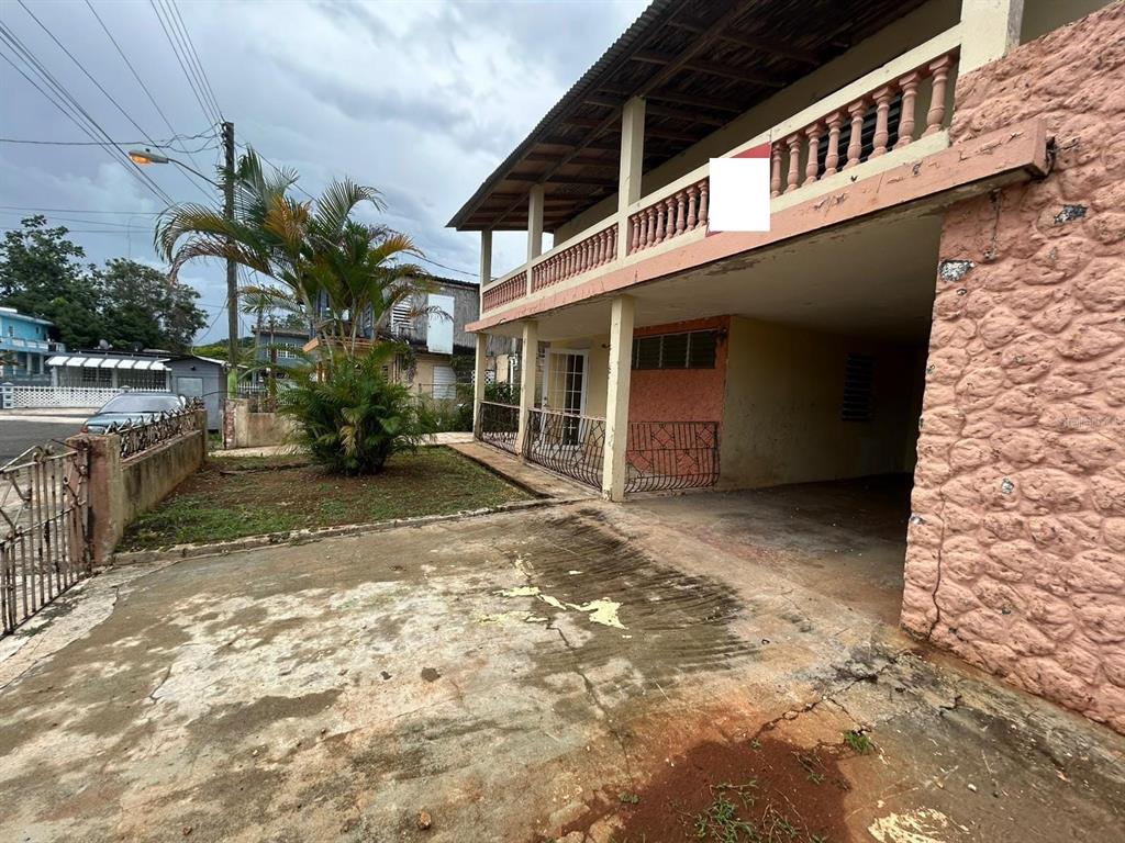 5 Calle Barceloneta, PR 00617 - Photo 4 of 40 a view of a house with a yard