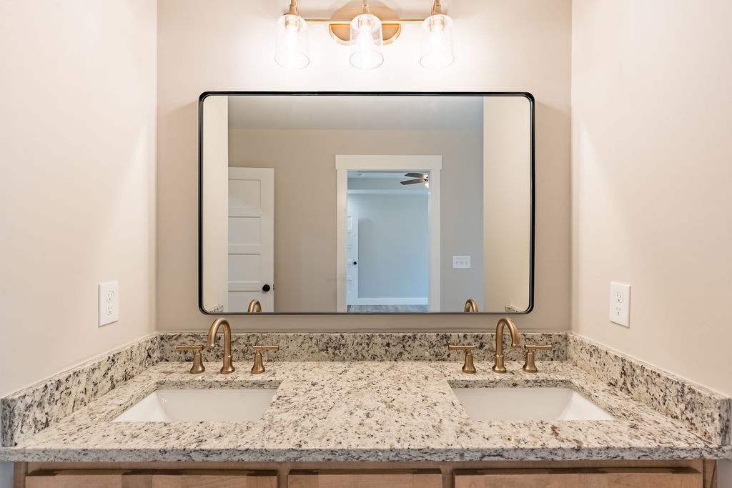 351 Chesnut Road Guthrie, KY 42234 - Photo 13 of 30 a bathroom with a granite countertop sink and a mirror