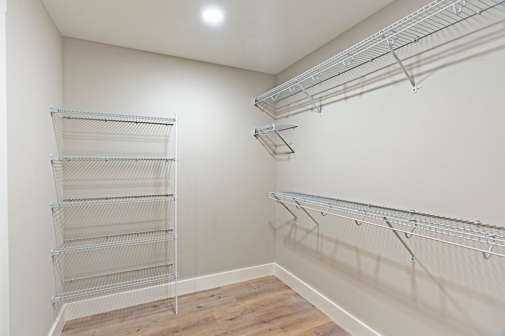 351 Chesnut Road Guthrie, KY 42234 - Photo 14 of 30 a view of walk in closet with empty racks