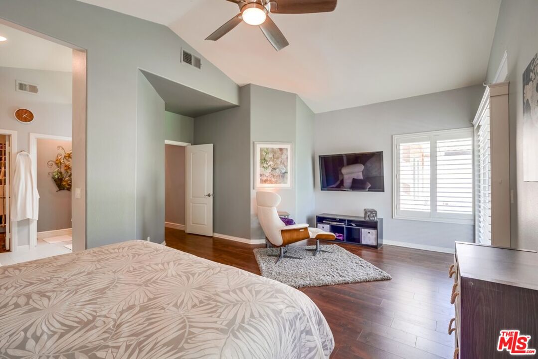 32377 Corte Santa Catalina Temecula, CA 92592 - Photo 12 of 27 a bedroom that has a bed and a chair in it