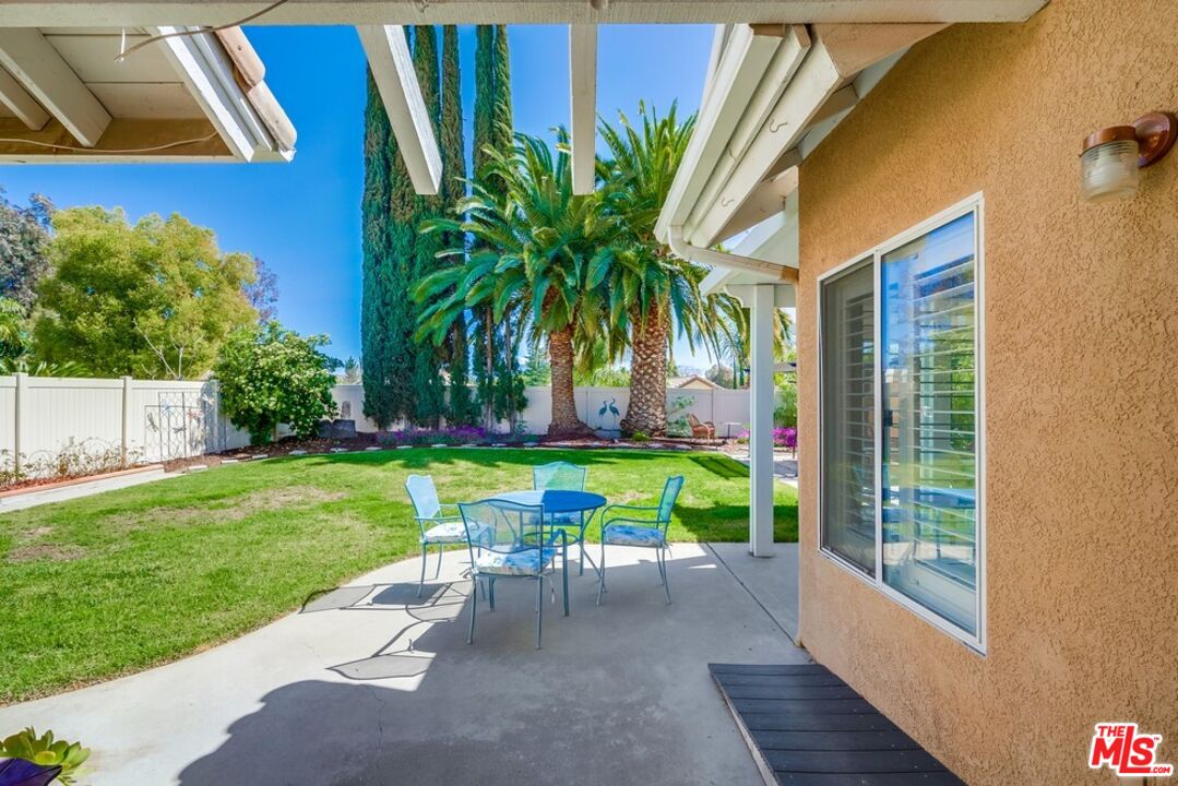 32377 Corte Santa Catalina Temecula, CA 92592 - Photo 21 of 27 a view of backyard with swimming pool and porch