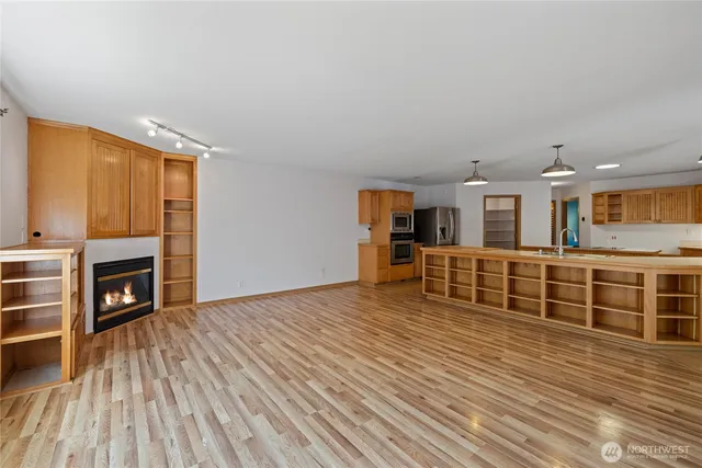 a bedroom with a bed and a chair