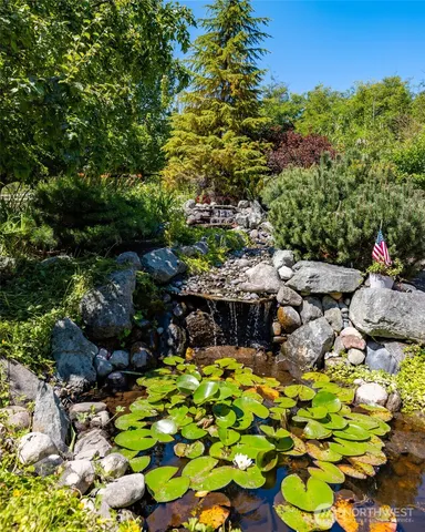a view of a livingroom with wooden floor