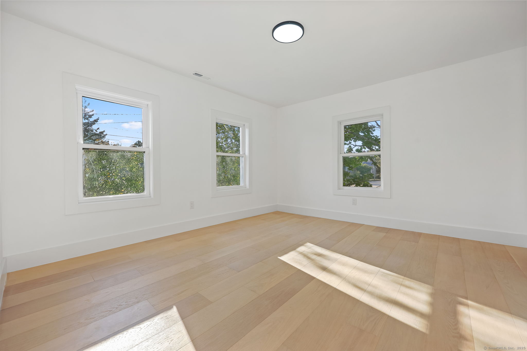 294 Thimble Island Road Branford, CT 06405 - Photo 22 of 39 an empty room with windows