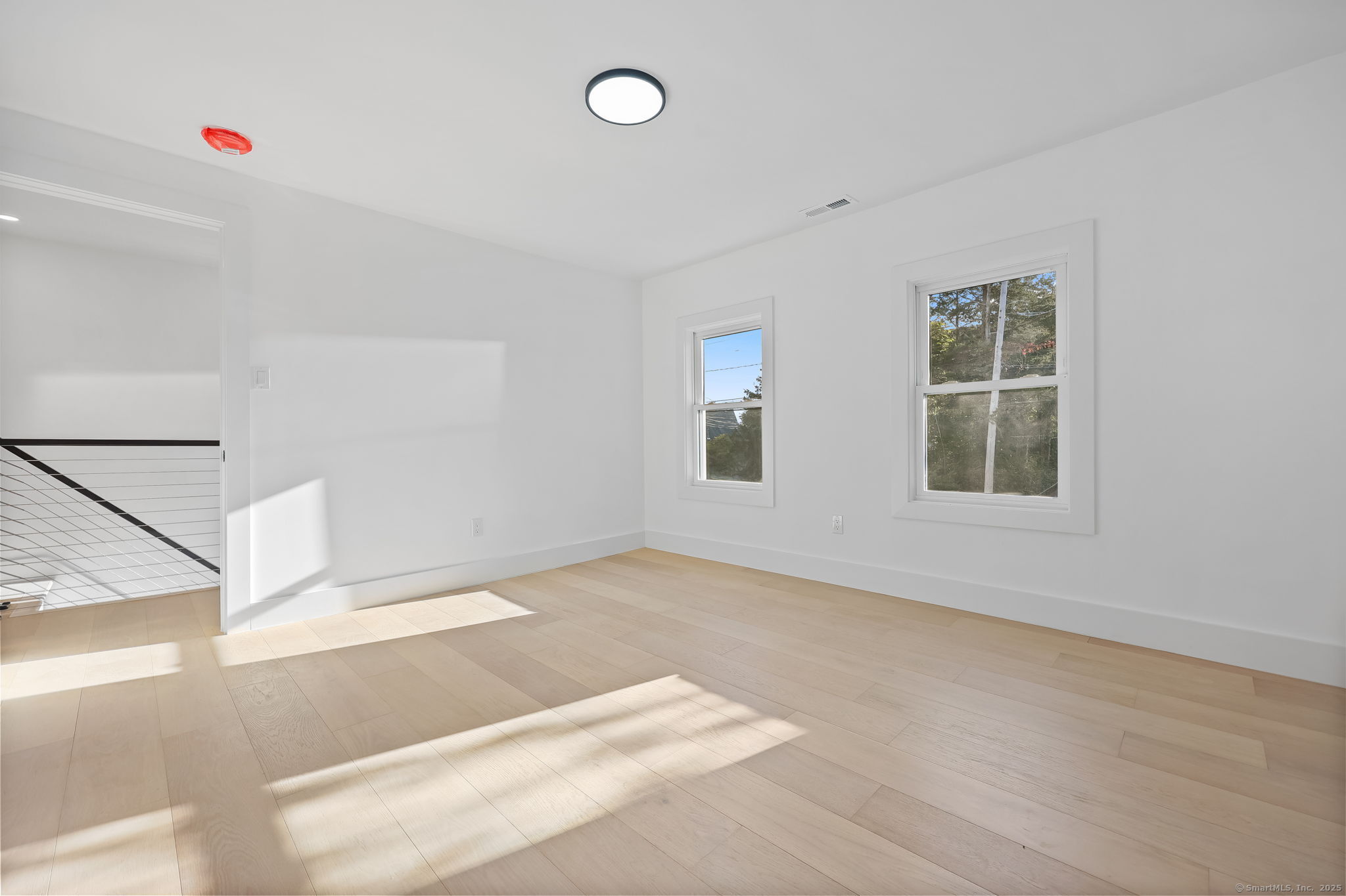 294 Thimble Island Road Branford, CT 06405 - Photo 23 of 39 a view of an empty room with windows