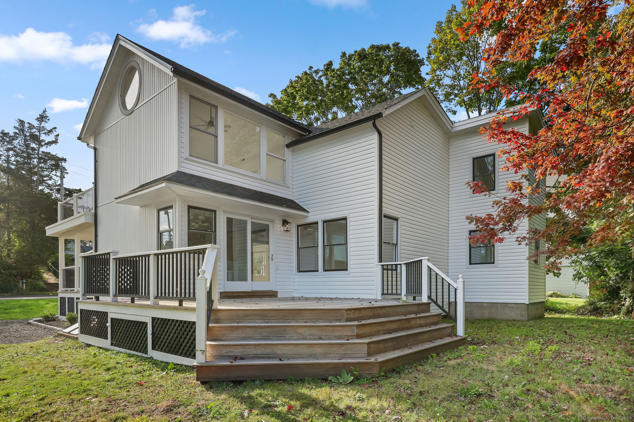 294 Thimble Island Road Branford, CT 06405 - Photo 32 of 39 a view of a house with a yard