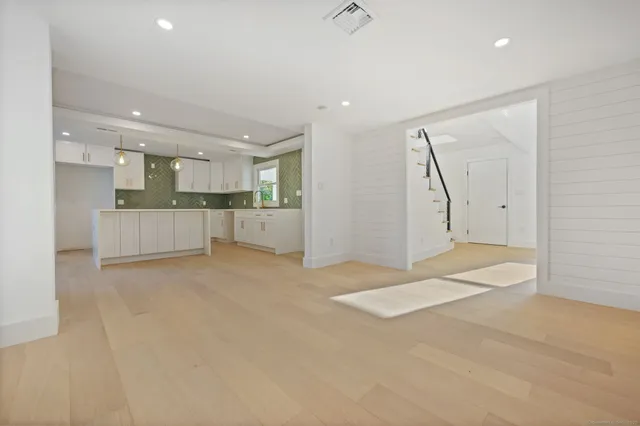 a view of a room that has a window in it