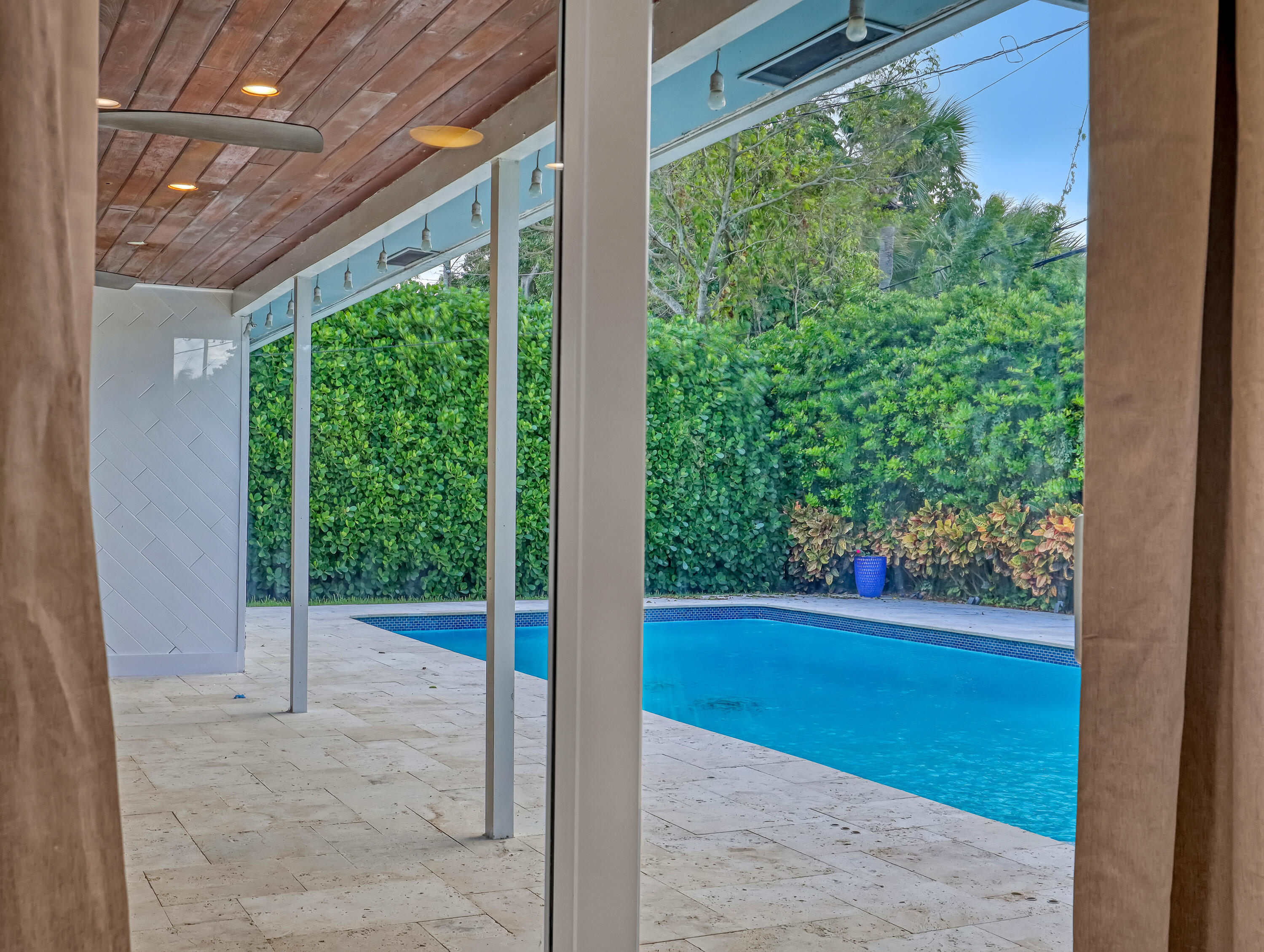 1298 Northwest 4th Street Boca Raton, FL 33486 - Photo 22 of 36 a view of a room with porch and mountain view