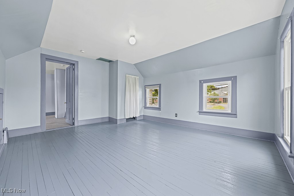 1425 Killian Road Akron, OH 44312 - Photo 27 of 41 Bedroom with lofted ceiling and light wood-style floors