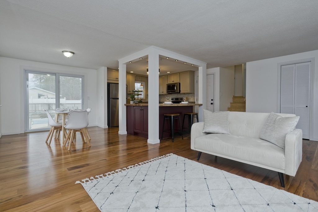 76 Paulk Terrace Springfield, MA 01128 - Photo 14 of 26 a living room with furniture and a table
