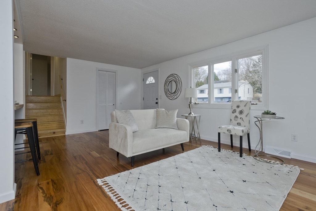 76 Paulk Terrace Springfield, MA 01128 - Photo 15 of 26 a living room with furniture and a large window