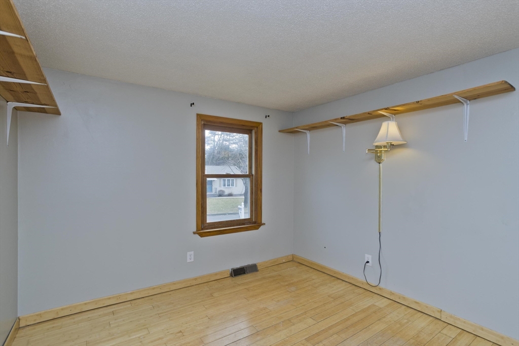 76 Paulk Terrace Springfield, MA 01128 - Photo 19 of 26 a view of an empty room with a window
