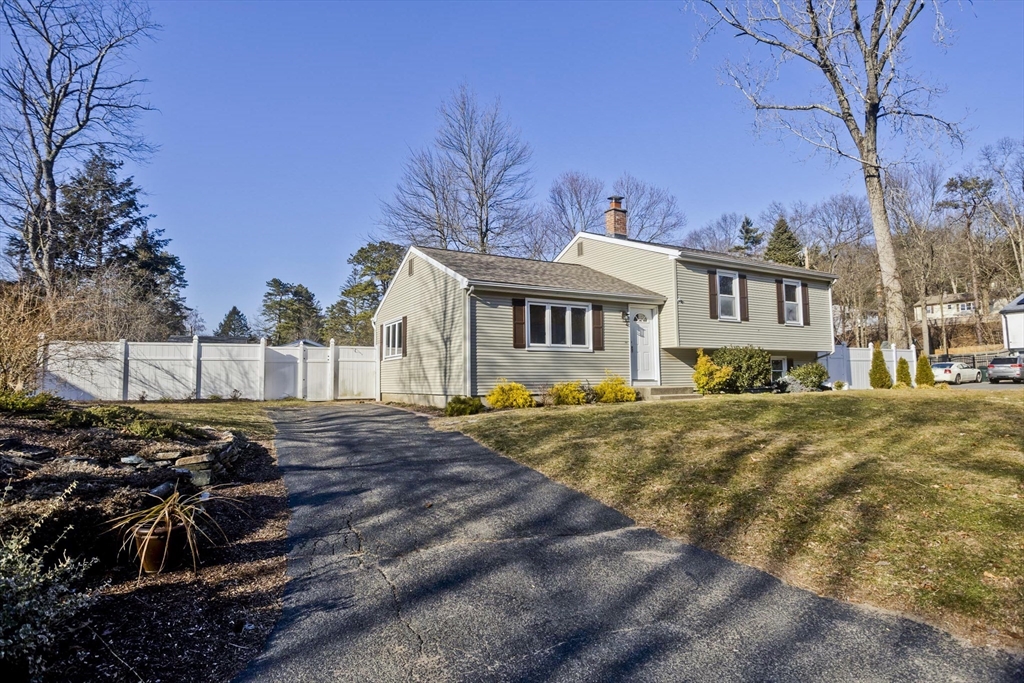 76 Paulk Terrace Springfield, MA 01128 - Photo 3 of 26 a view of a house with snow on the side of road